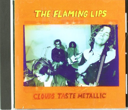 The Flaming Lips - Clouds Taste Metallic - CD - CD Muy Buen Estado / Portada Muy Buen Estado (VG+/VG+)