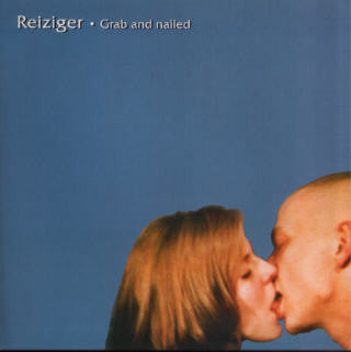 Reiziger – Grab And Nailed - 7" - Naranja / Orange - 2000 - Day After Records – DAY 26 - Muy Buen Estado / Very Good Condition (M- / VG+)