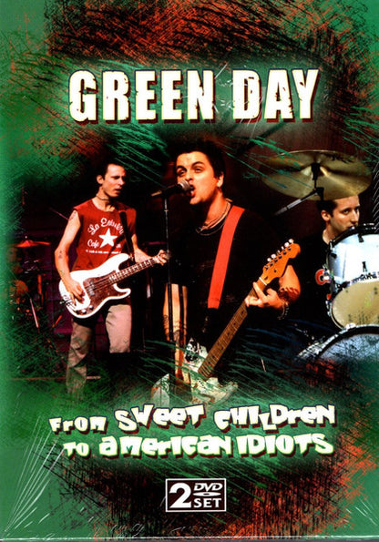 Green Day – From Sweet Children To American Idiot - 2xDVD - DVDs Nuevos (M) / Portadas Nuevas (M) / Slipcase Muy Buen Estado (VG+)