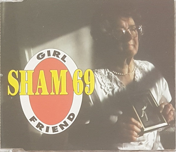 Sham 69 – Girlfriend - CD-SG - 1995 - A Plus Eye Records – AISCD 001 - CD Muy Buen Estado (VG+) / Portada Como Nueva (M-)