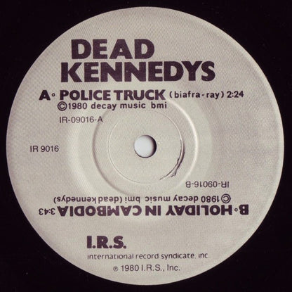 Dead Kennedys – Holiday In Cambodia / Police Truck - 7" - With Insert - 1980 - I.R.S. Records – IR 9016 - Muy Buen Estado / Very Good Condition (VG+ / VG+)