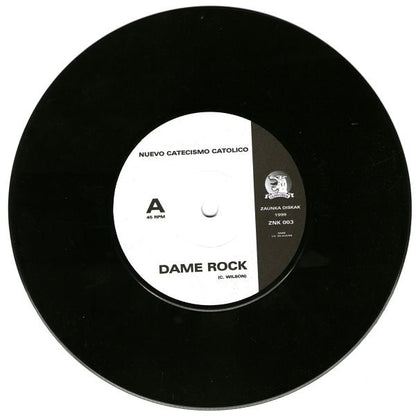 Nuevo Catecismo Catolico – Dame Rock - 7" - 1999 - Zaunka Diskak – ZNK 003 - Como Nuevo / Like New (M- / M-)