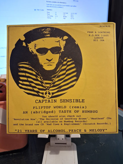 Captain Sensible – Fliptop World (Remix) / An (Abridged) Taste Of Humbug - 7" - White Label - 1996 - Fear And Loathing – RCRPA 20 - Vinilo Como Nuevo / Portada Como Nueva (M-/M-)